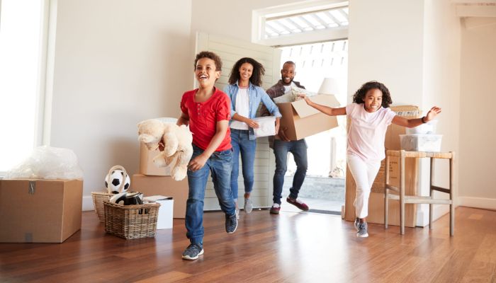 Happy Family Running In Their New House - Forge Home Consulting